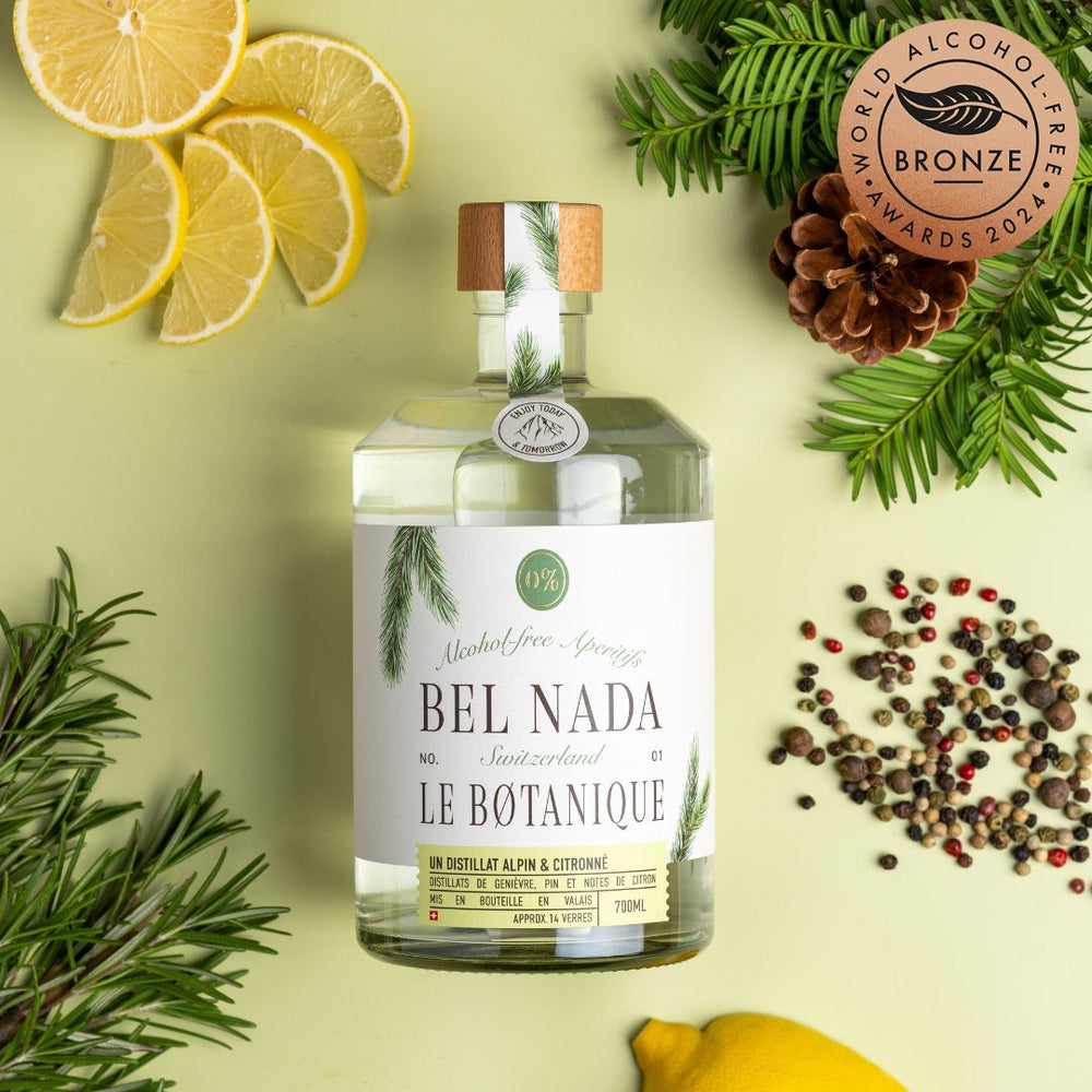 Alcohol-free gin non alcoholic aperitif, made in switzerland, juniper berries distilled with pine and lemon flavours. Natural ingredients, low in sugar